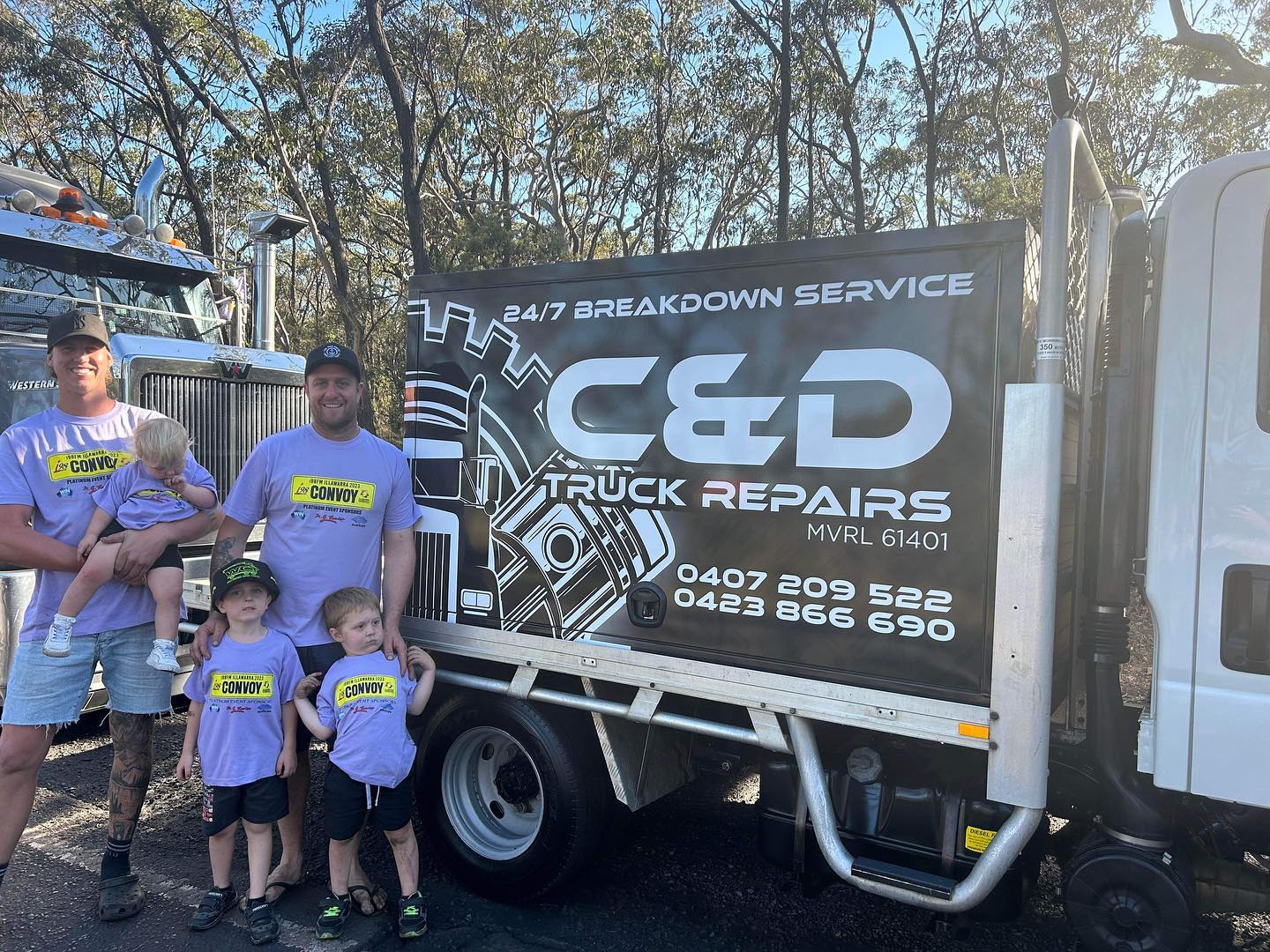 The C and D Truck Repairs family beside their truck at the Illawarra Convoy