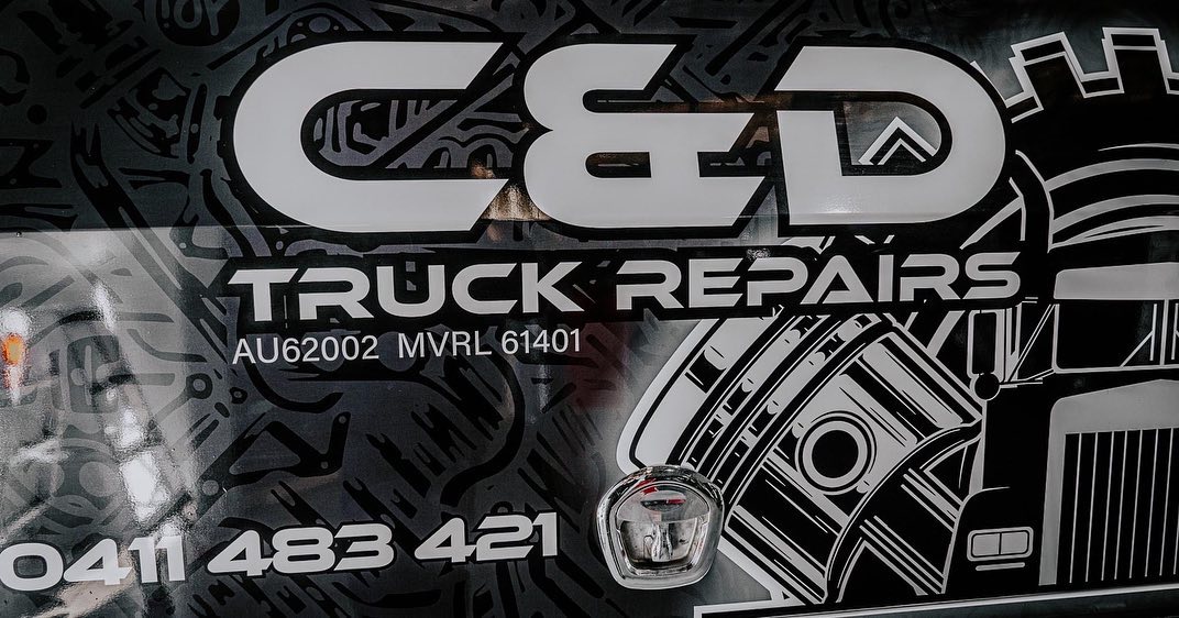 C and D Truck Repairs signage with licence numbers MVRL 61401 and AU 62002